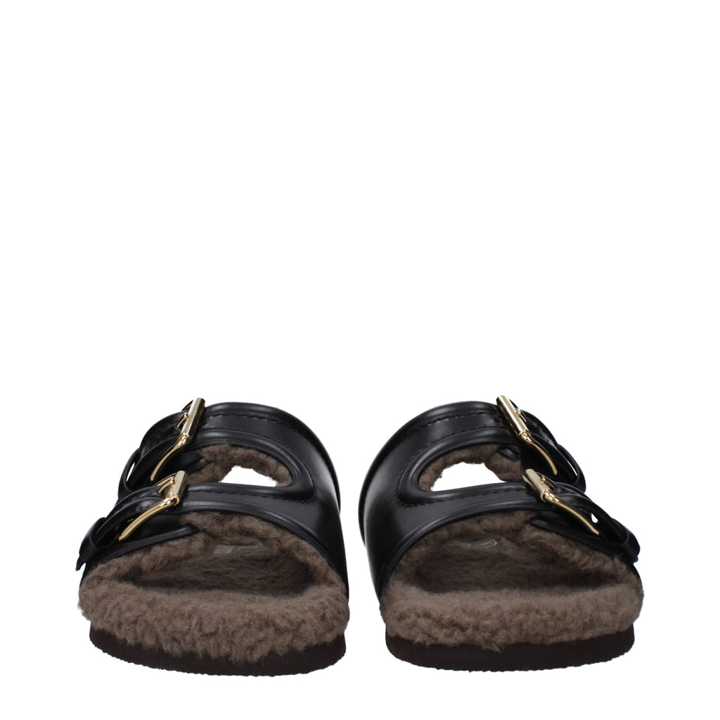 Mules Valentino Garavani en cuir noir